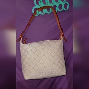 Dooney and bourke cream color purse ( like new )